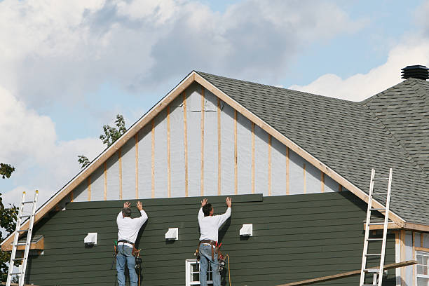 Professional Siding technician working in Wellington, CO